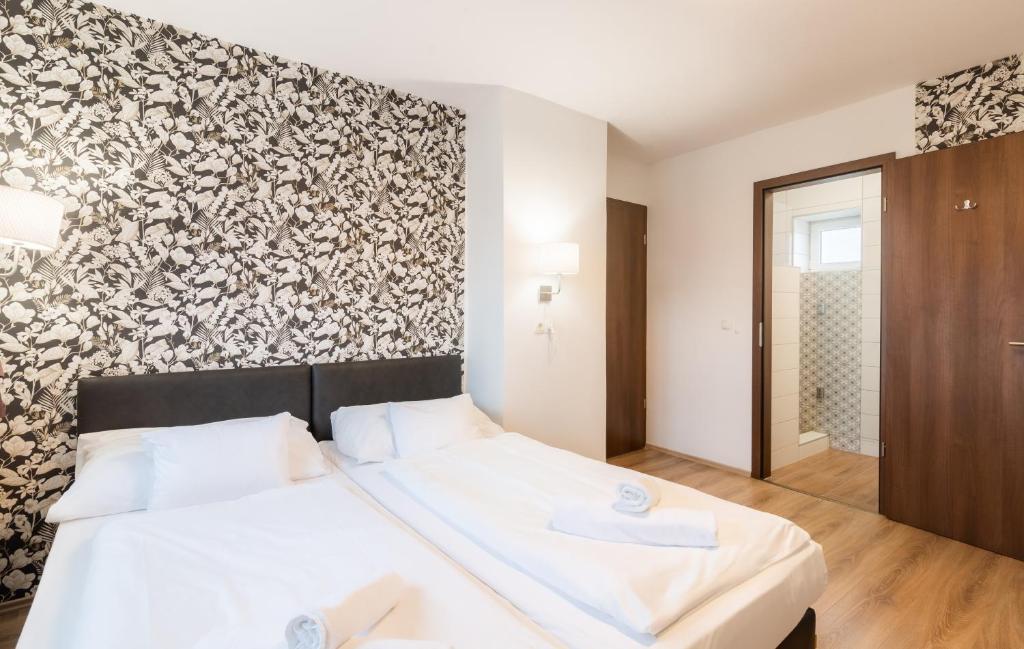 Postel nebo postele na pokoji v ubytování Autohof 171 Hotel Hegyeshalom