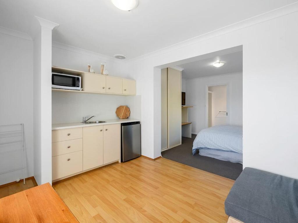 Kuchyň nebo kuchyňský kout v ubytování Kalisti Suites - Fira Suite