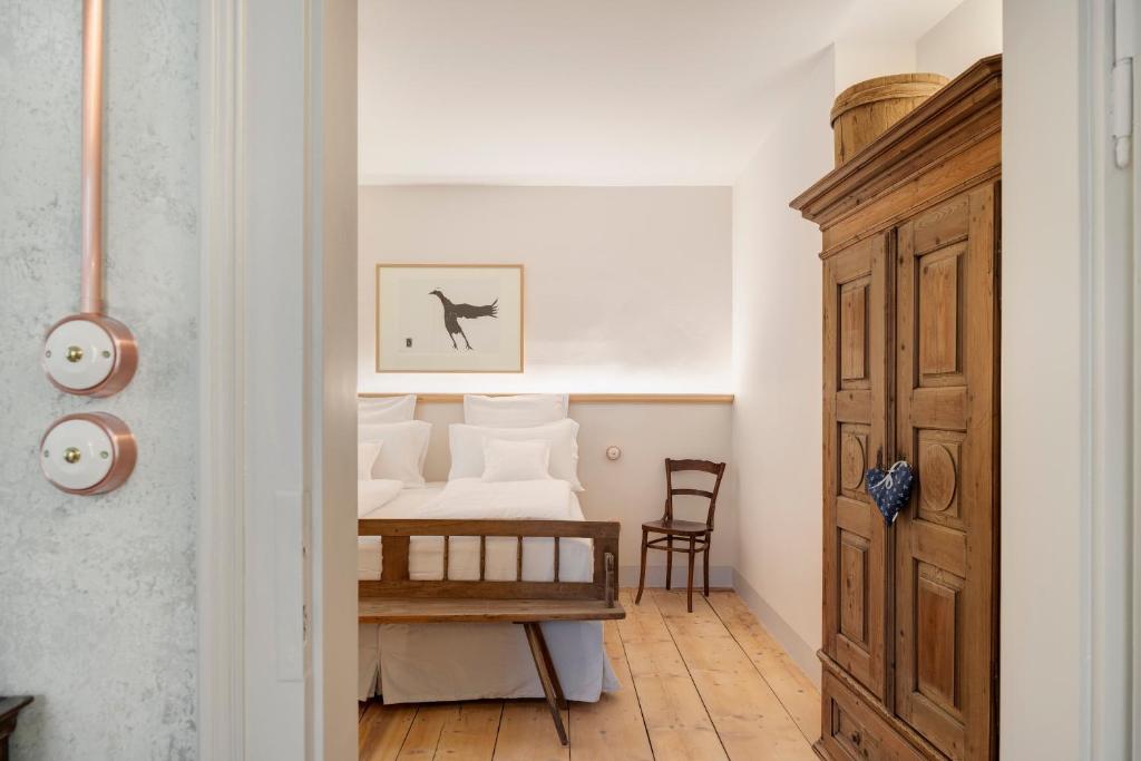 Posteľ alebo postele v izbe v ubytovaní Steinach Townhouse Meran