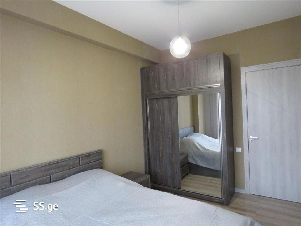 Postel nebo postele na pokoji v ubytování tbilisi