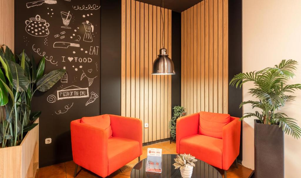 Posezení v ubytování Autohof 171 Hotel Hegyeshalom