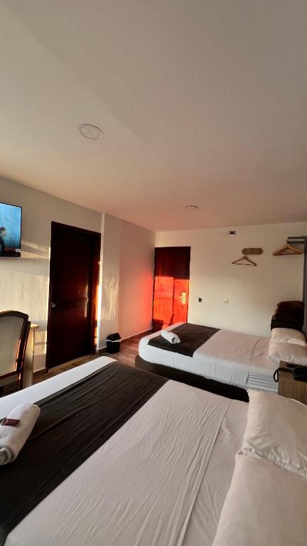 Letto o letti in una camera di Hotel Gran Conquistador 33