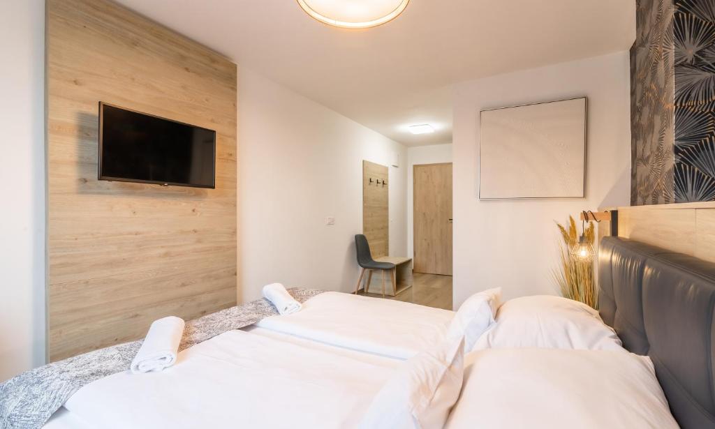 Postel nebo postele na pokoji v ubytování Autohof 171 Hotel Hegyeshalom