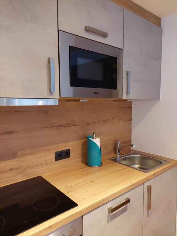 Una cocina o zona de cocina en Ferienwohnung Tramunt