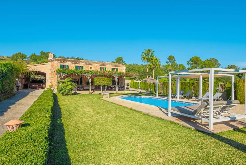 an estate with a swimming pool and a house at Es Rafal in Santa Margalida