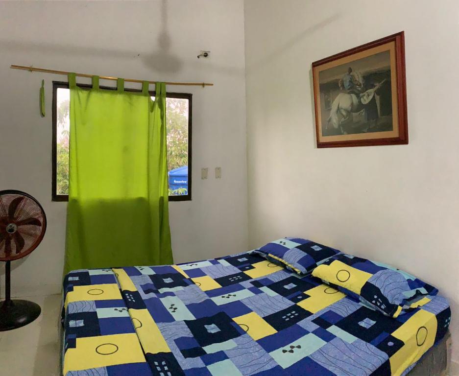 Postel nebo postele na pokoji v ubytování CABAÑA VILLA DEL COCO