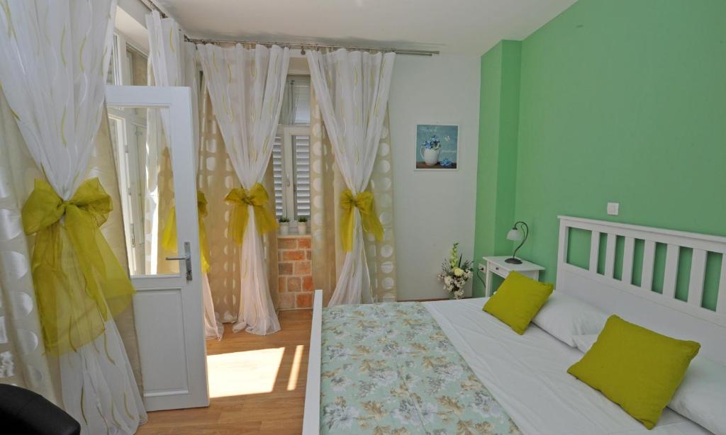 Postel nebo postele na pokoji v ubytování Luxury Rooms Nirvana