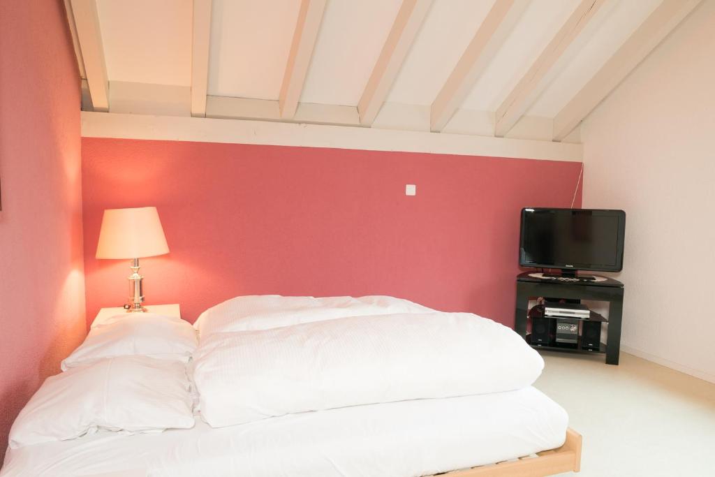 Postel nebo postele na pokoji v ubytování Apartment Hinterberg