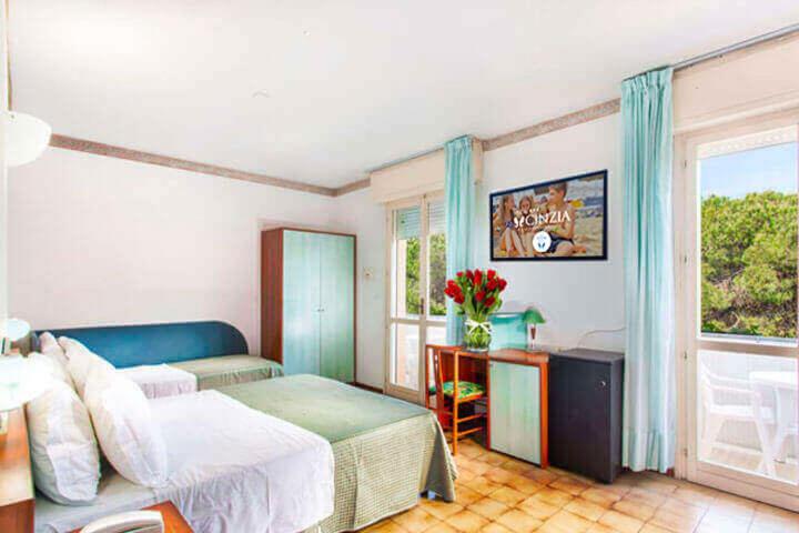 Postel nebo postele na pokoji v ubytování Hotel Cinzia