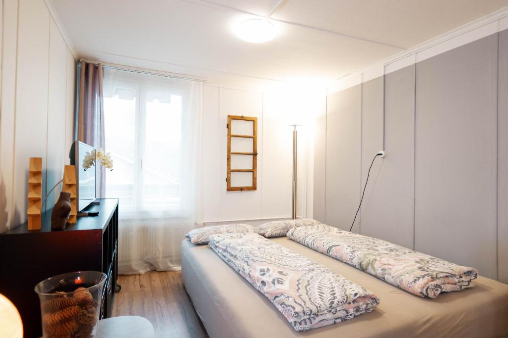 Postel nebo postele na pokoji v ubytování Apartment Heimathus