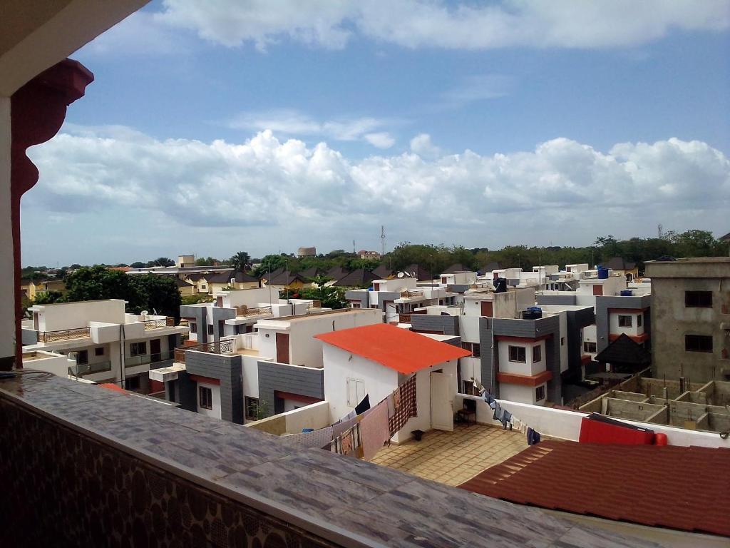 a view of a city from a balcony at BARAKAH ESTATE APARTMENTS in Sere Kunda
