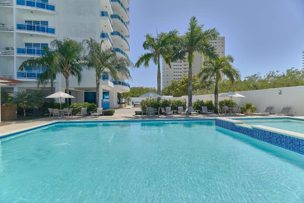 Bazén v ubytování Elegante Aqua Marine Apartamento Juan Dolio nebo v jeho okolí
