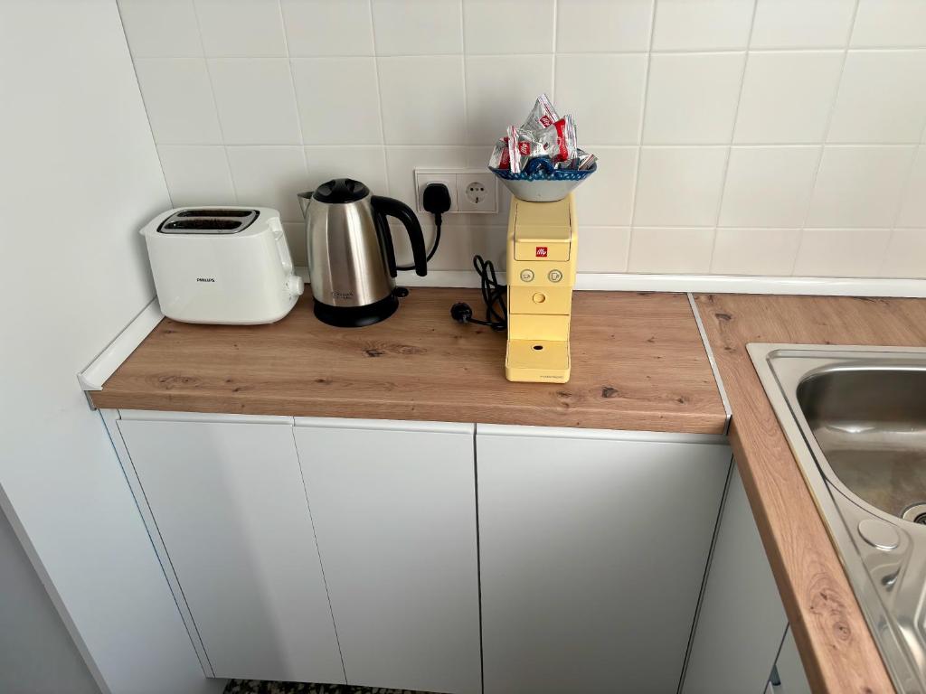 Kuchyň nebo kuchyňský kout v ubytování Tradicional apartamento central de 2 camas dobles