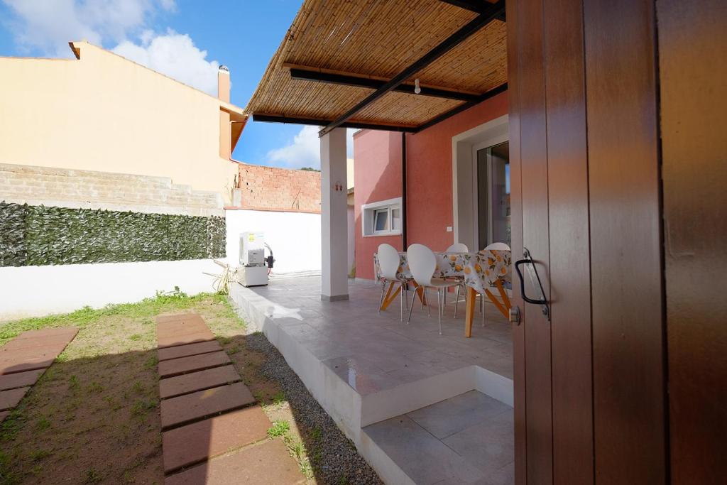 an external view of a house with a patio at Newly built Holiday House in Teulada in Teulada