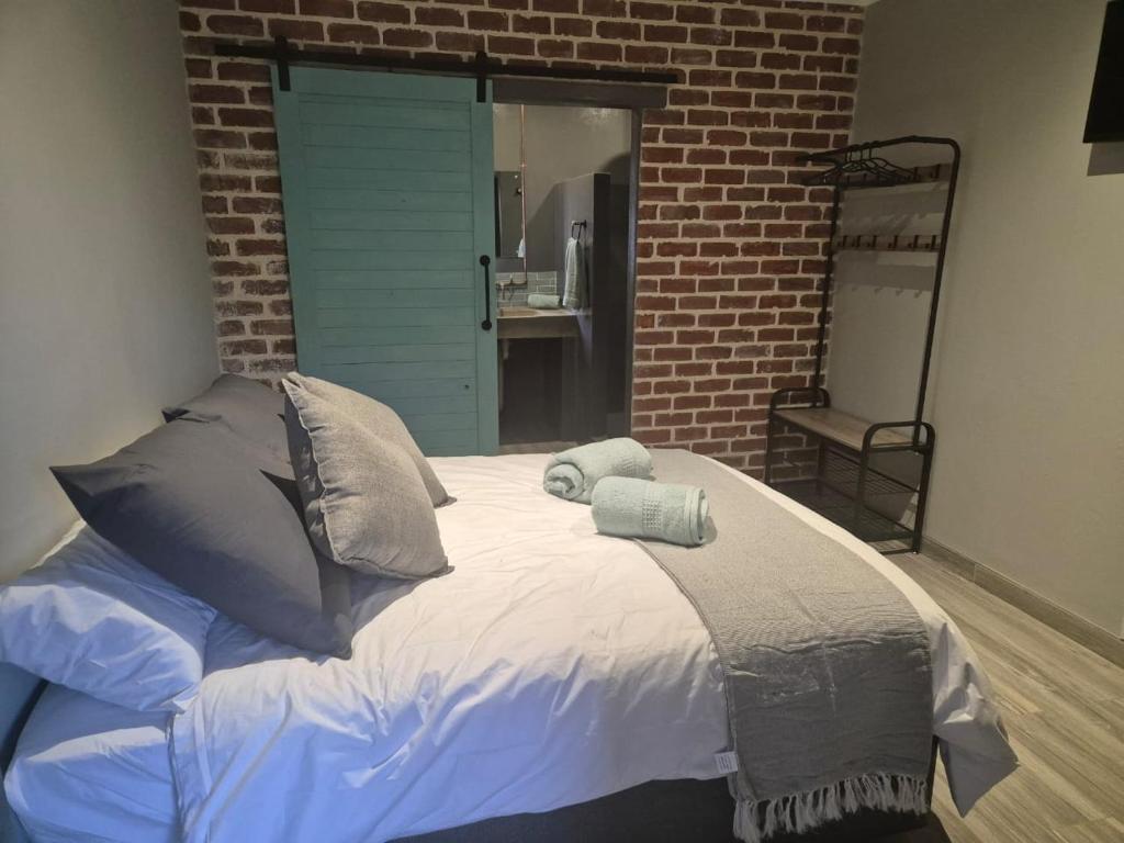 Postel nebo postele na pokoji v ubytování @241 Enkeldoorn Guesthouse