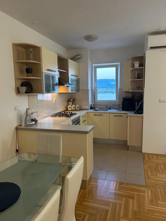 Kuchyň nebo kuchyňský kout v ubytování Apartment Antonia