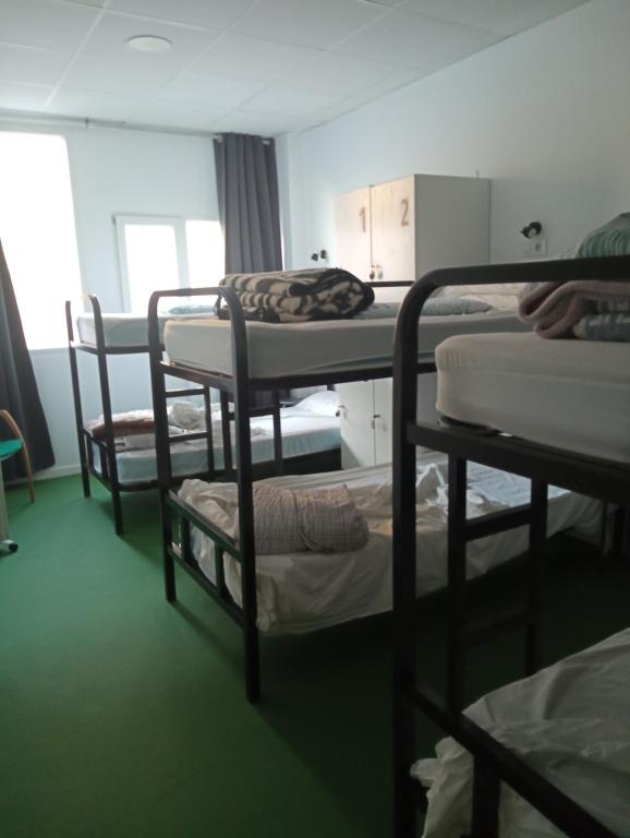 Postel nebo postele na pokoji v ubytování Hostel Allegro