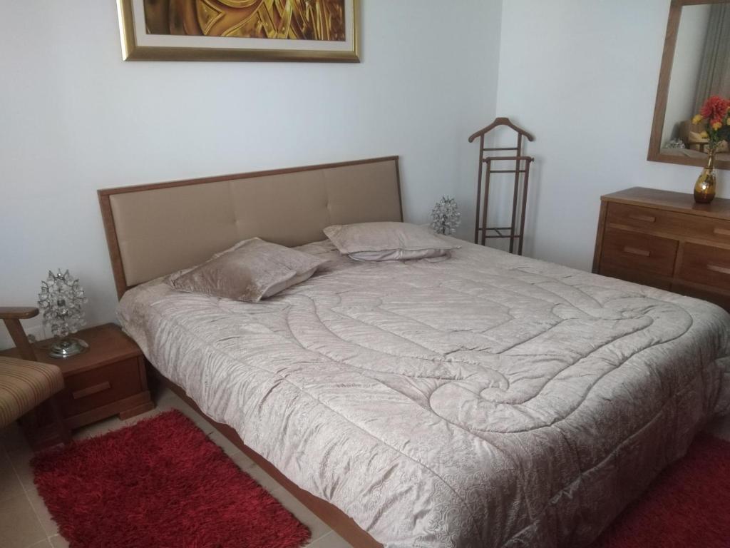 Ένα ή περισσότερα κρεβάτια σε δωμάτιο στο Yasmina