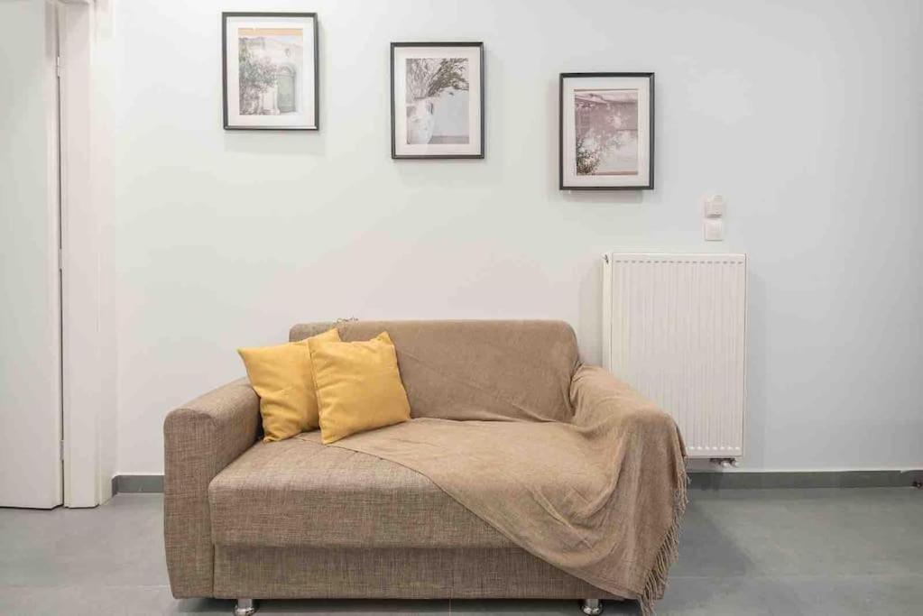 Posezení v ubytování Cozy apartment in a new building apartment 4