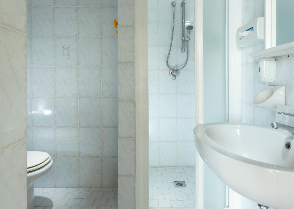 Koupelna v ubytování Hotel Vela d'Oro