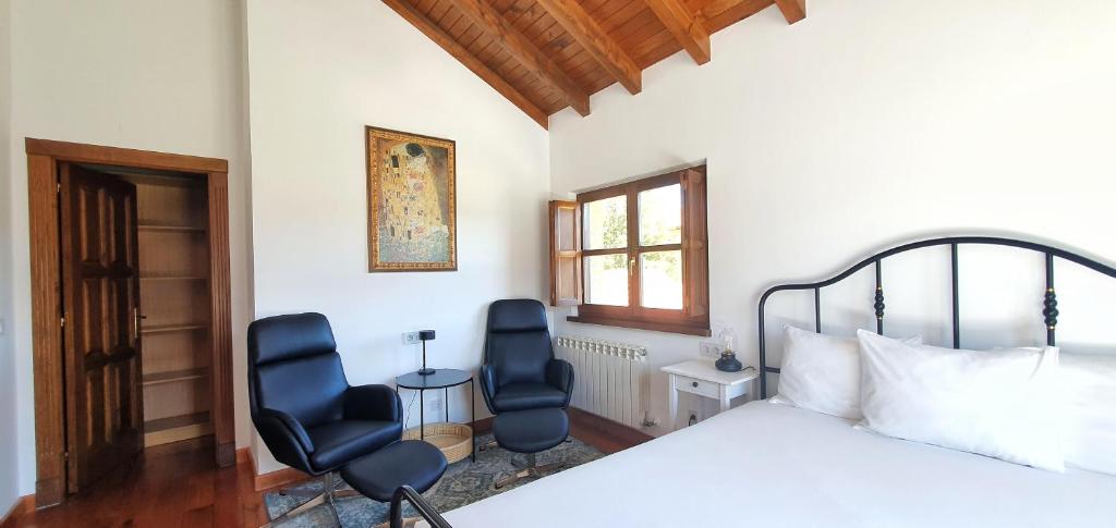 Postel nebo postele na pokoji v ubytování Refugio del Cares