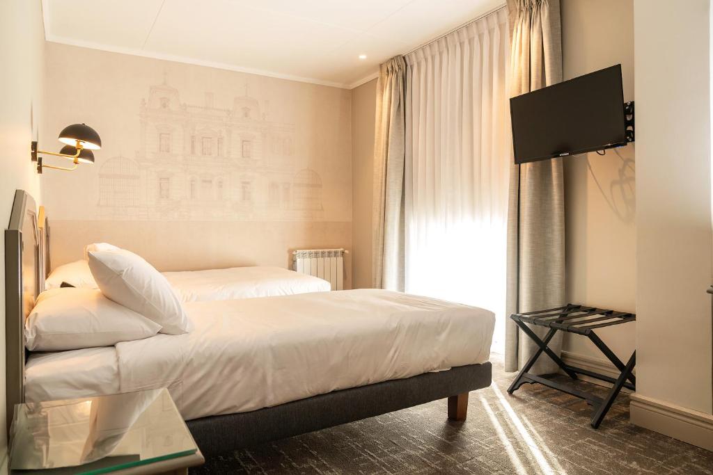 TV a/nebo společenská místnost v ubytování Hotel José Nogueira