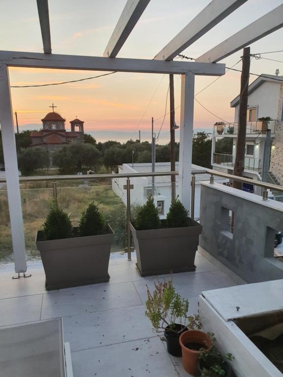 Balkón nebo terasa v ubytování THE GREY VILLA