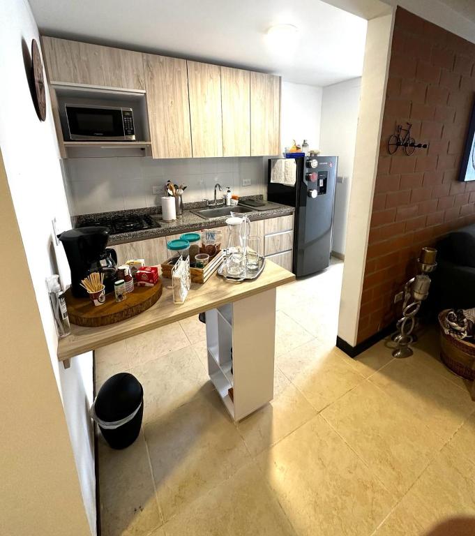 Kuchyň nebo kuchyňský kout v ubytování Perfecto apartamento para descansar