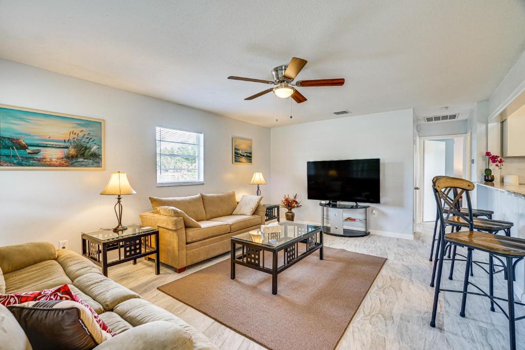 a living room with a couch and a tv at Newly Remodeled Home Less Than 2 Mi to Punta Gorda Airport in Punta Gorda