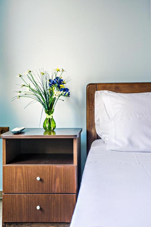 Кровать или кровати в номере Romeo Seaside Luxury Suite