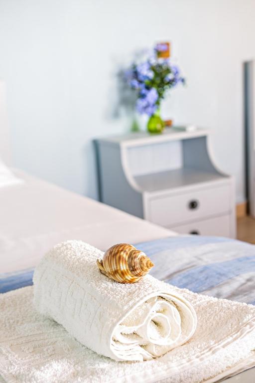 Кровать или кровати в номере Romeo Seaside Luxury Suite
