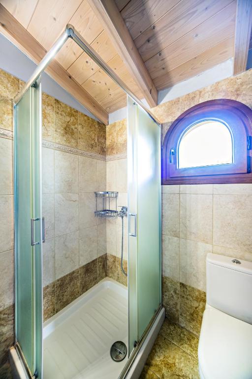Ванная комната в Romeo Seaside Luxury Suite