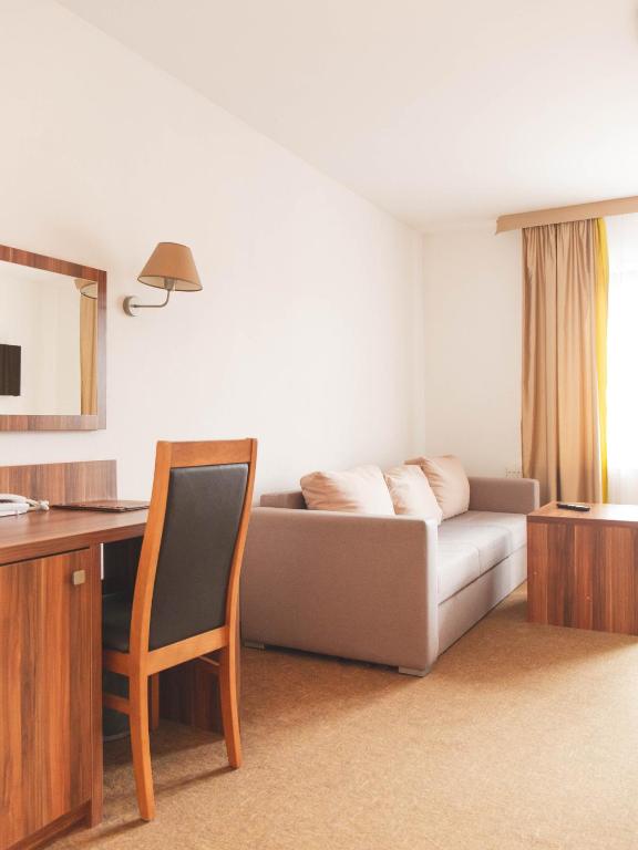 Postel nebo postele na pokoji v ubytování Hotel Beskidian