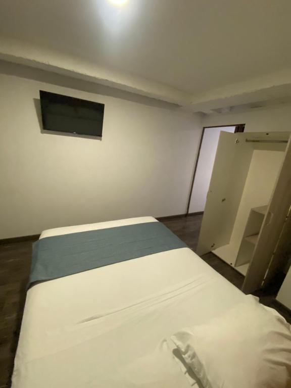 Postel nebo postele na pokoji v ubytování Alojamiento Carriquí