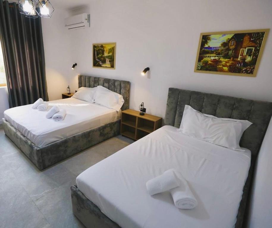 Postel nebo postele na pokoji v ubytování VILA ALIZEE Hotel