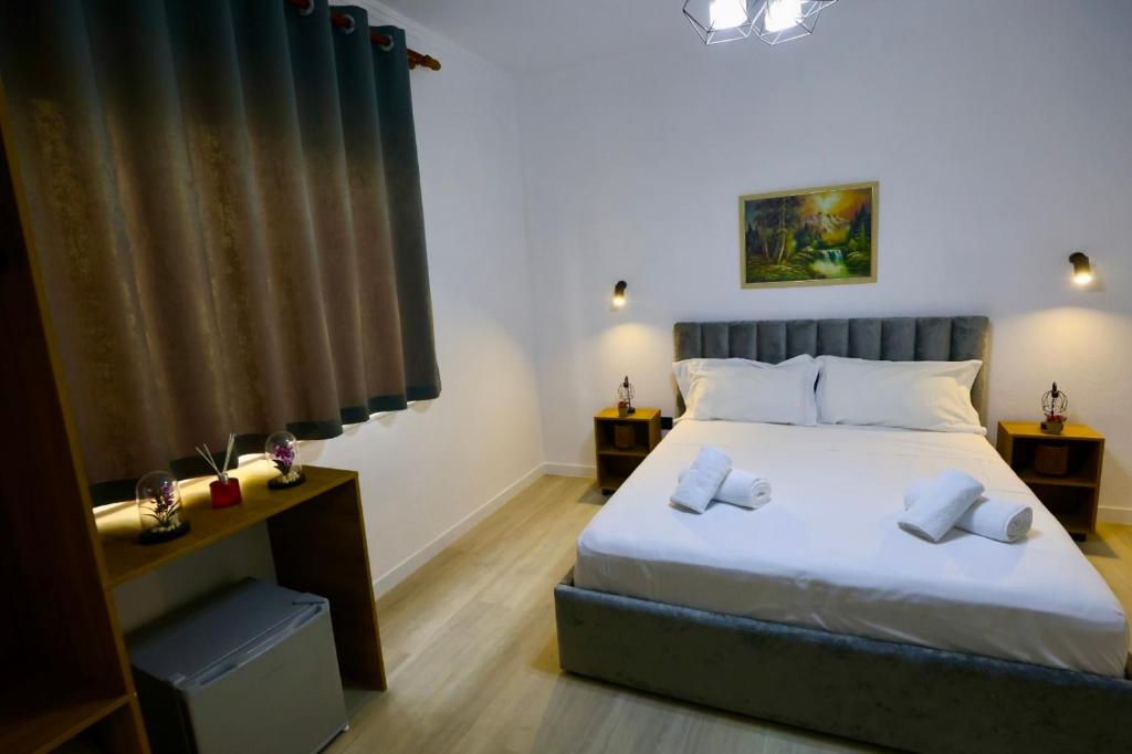 Postel nebo postele na pokoji v ubytování VILA ALIZEE Hotel