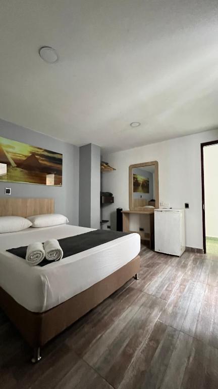 Letto o letti in una camera di Hotel Gran Conquistador 33