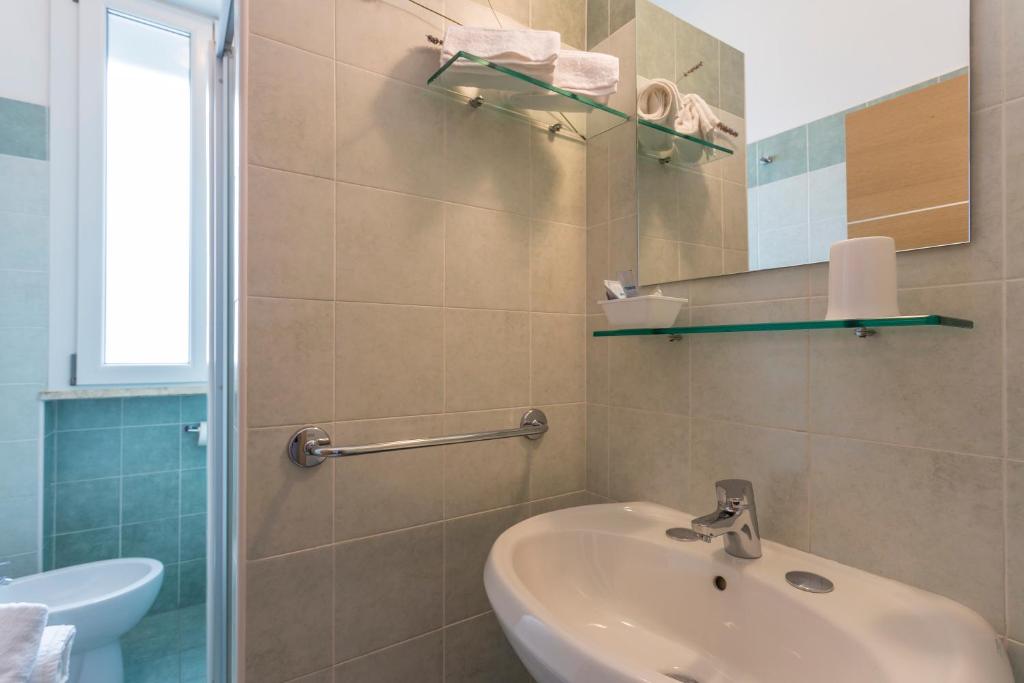 Koupelna v ubytování Hotel Dafne