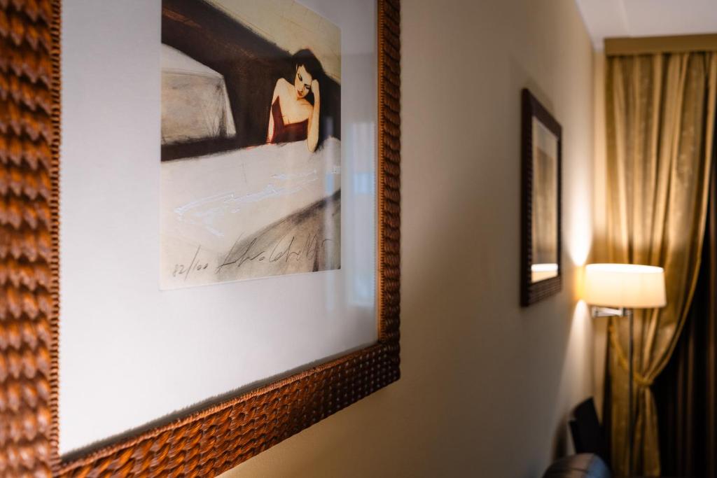 Postel nebo postele na pokoji v ubytování Hotel Airone - Ombrellone incluso al bagno Dolce Vita a Marina dal 1 giugno al 15 settembre