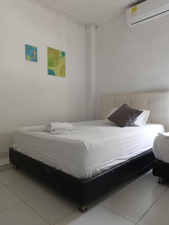 Postel nebo postele na pokoji v ubytování Riviera Central Hotel - Monteria