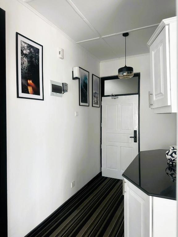 Kuchyň nebo kuchyňský kout v ubytování AWHILE CASA