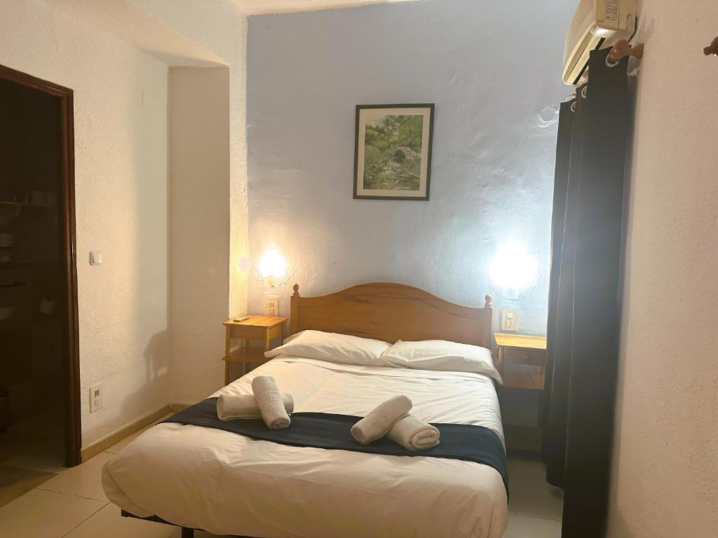 Ένα ή περισσότερα κρεβάτια σε δωμάτιο στο Barraca Suites