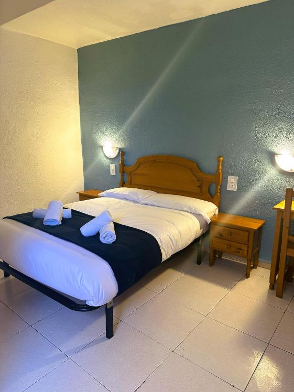 Ένα ή περισσότερα κρεβάτια σε δωμάτιο στο Barraca Suites