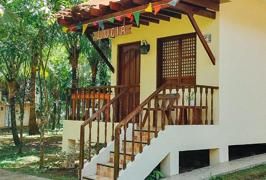 a house with a staircase in front of it at RedDoorz @ Hilarion's Farm Majayjay, Laguna in Majayjay