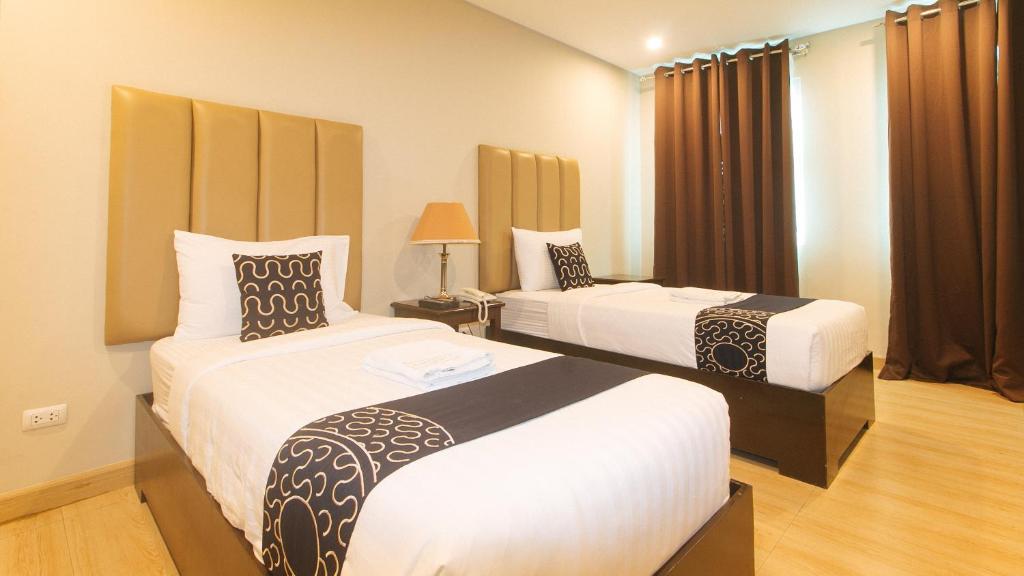 Postel nebo postele na pokoji v ubytování Asrodel Hotel RedPartner