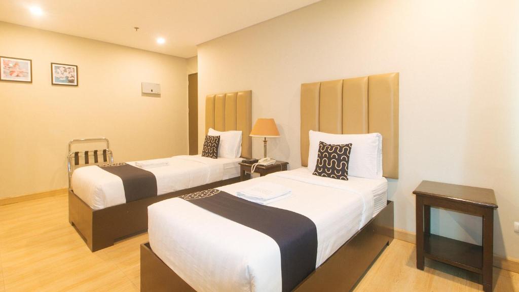 Postel nebo postele na pokoji v ubytování Asrodel Hotel RedPartner