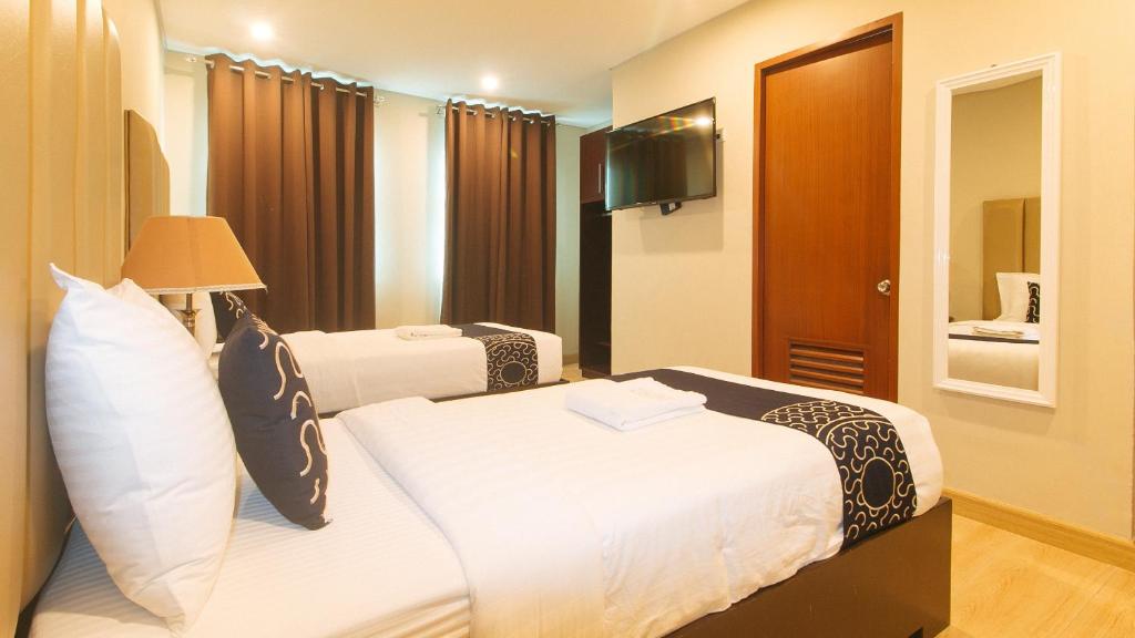 Postel nebo postele na pokoji v ubytování Asrodel Hotel RedPartner