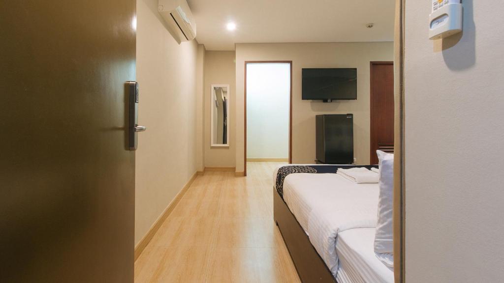 Postel nebo postele na pokoji v ubytování Asrodel Hotel RedPartner