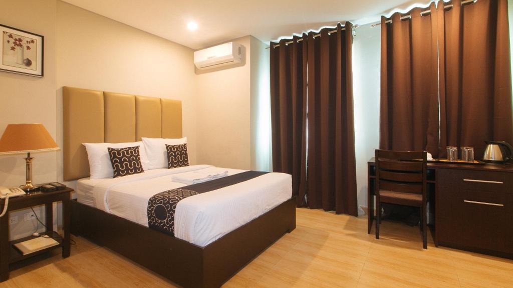 Postel nebo postele na pokoji v ubytování Asrodel Hotel RedPartner