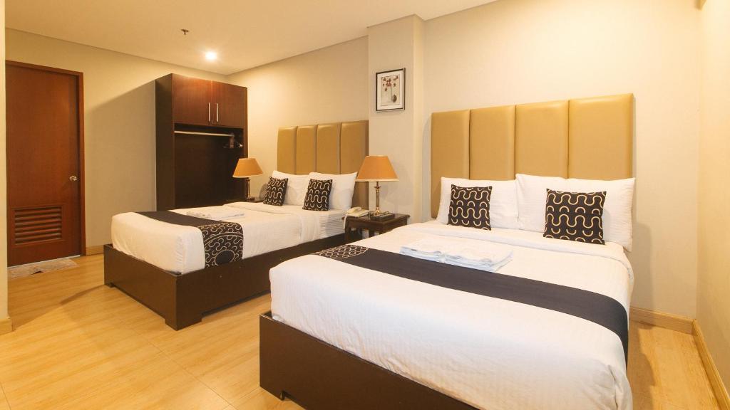 Postel nebo postele na pokoji v ubytování Asrodel Hotel RedPartner